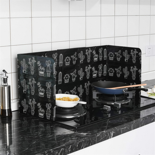 Foldable Splatter Shield standing on a stovetop