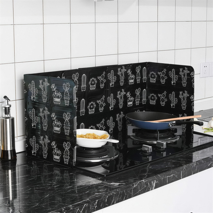 Foldable Splatter Shield standing on a stovetop